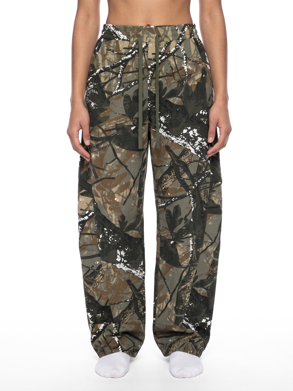 White and grey flame icon on Unisex Tree Camo Barrel Leg Pants